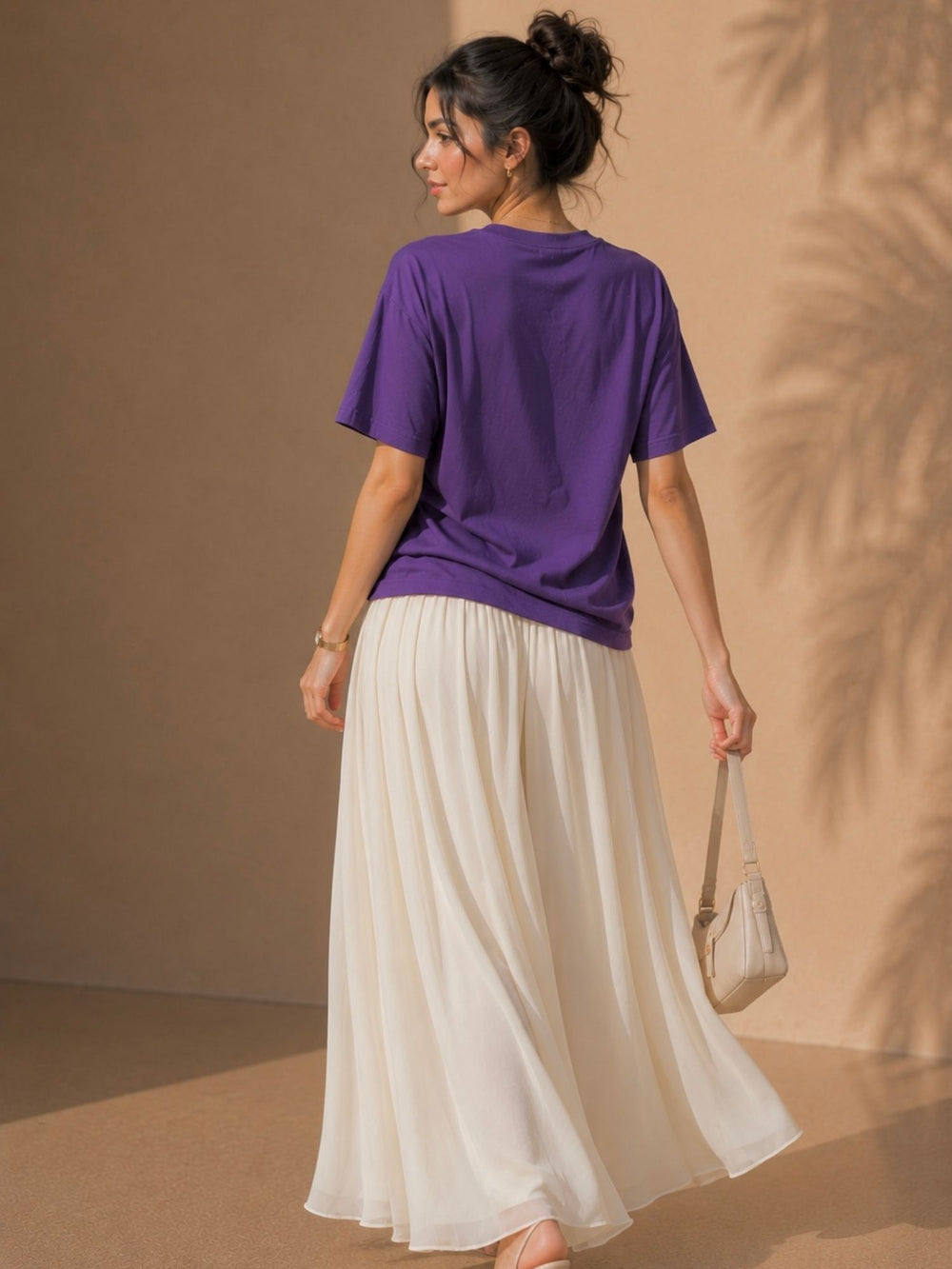 Women's purple oversized boxy t-shirt with Rooted and Wild print, view 2 | FLCN