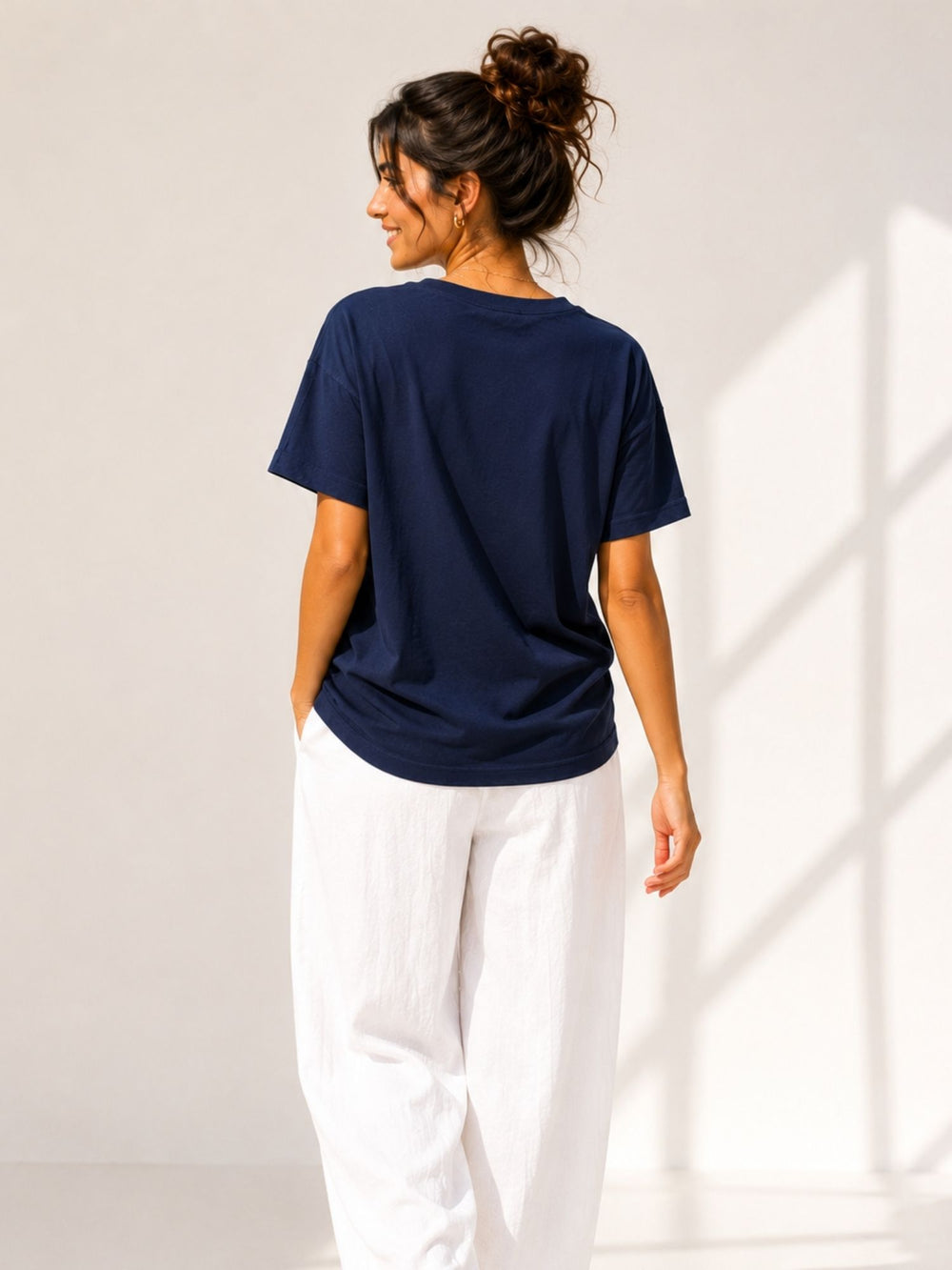 Women's navy blue oversized boxy t-shirt with Watercolour Flowers print, view 2 | FLCN