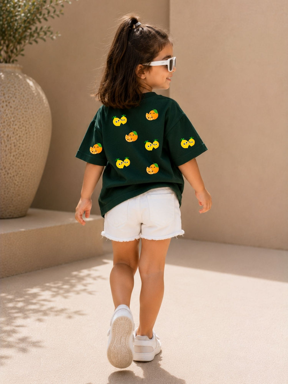 Girls' green oversized drop-shoulder t-shirt with Lemons and Oranges print, view 2 | FLCN