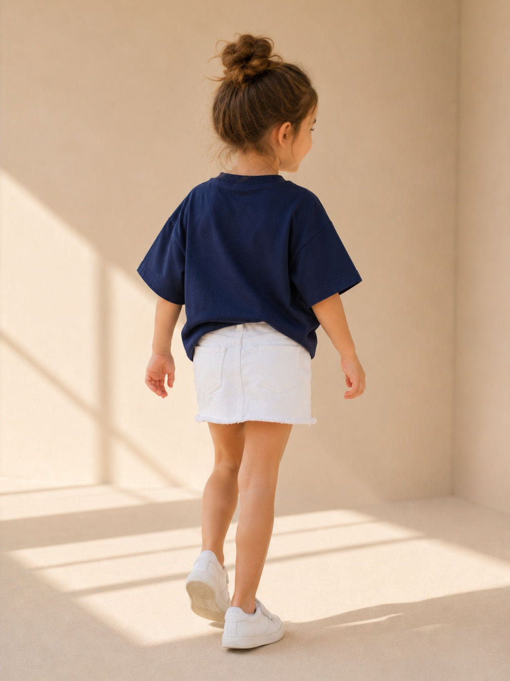 Girls' navy blue & white oversized drop-shoulder t-shirt with contrast pocket, view 2 | FLCN