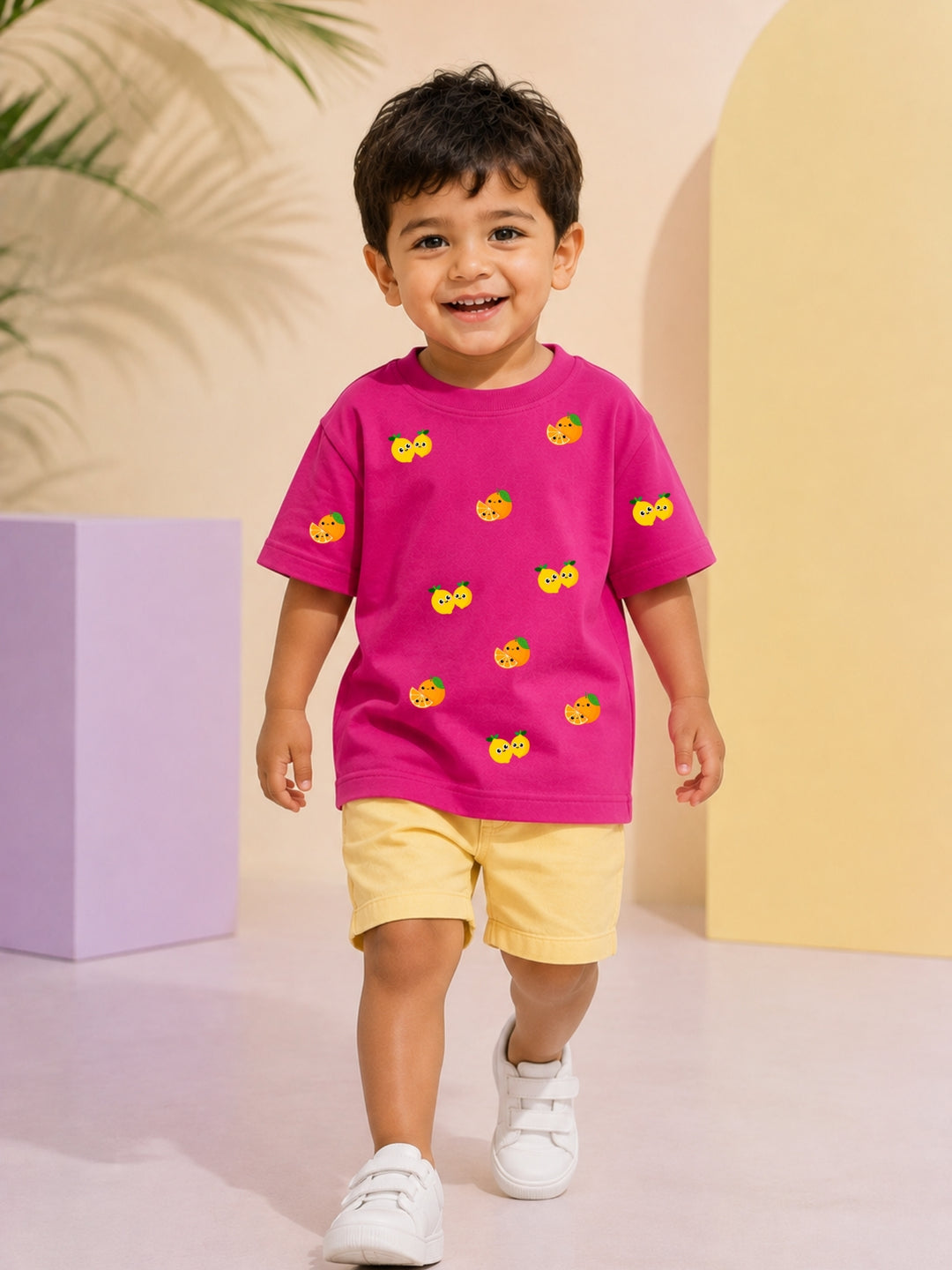 Boys' magenta pink oversized drop-shoulder t-shirt with Lemons and Oranges print | FLCN