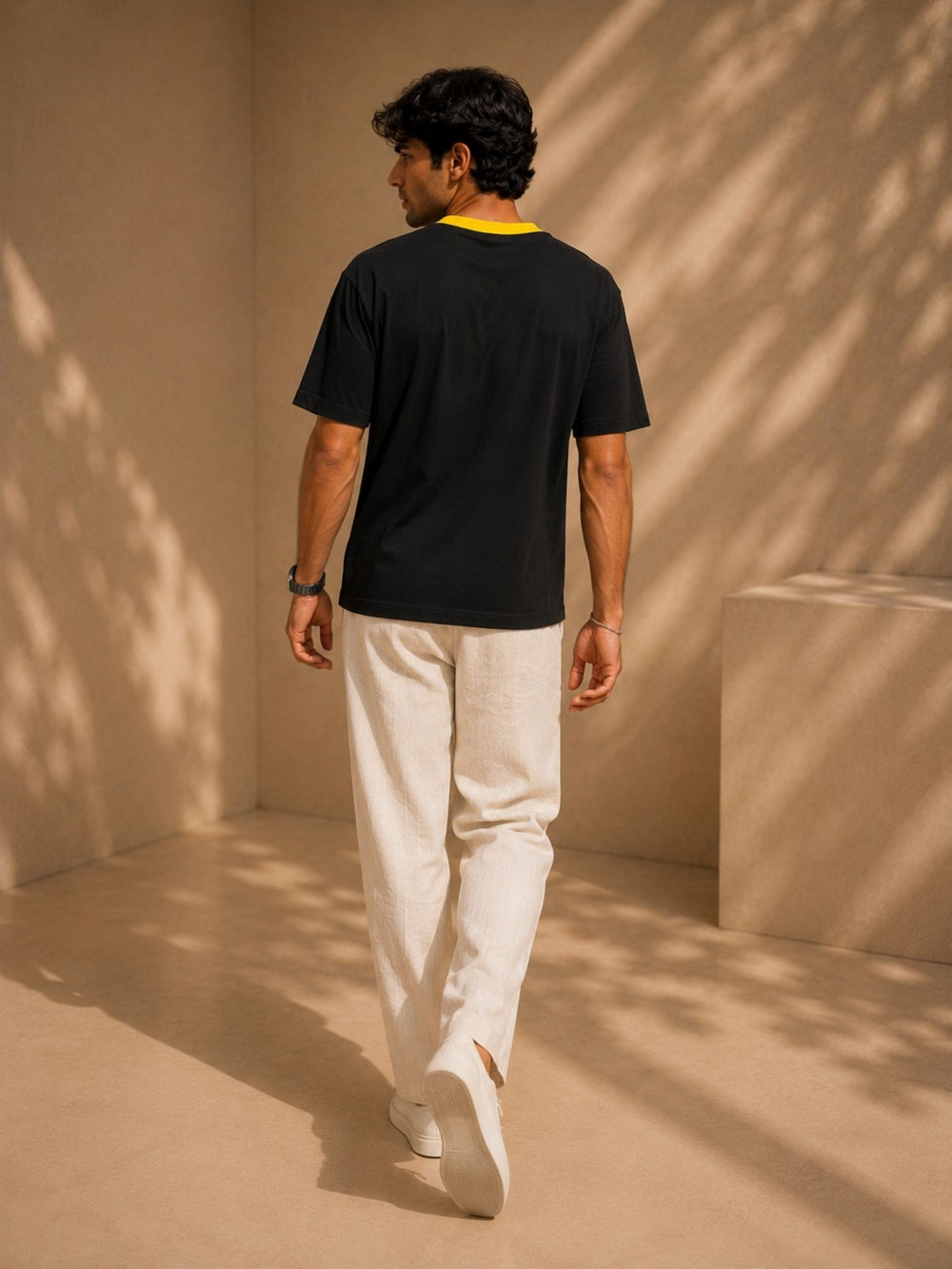 Men's black & yellow oversized boxy t-shirt, view 2 | FLCN