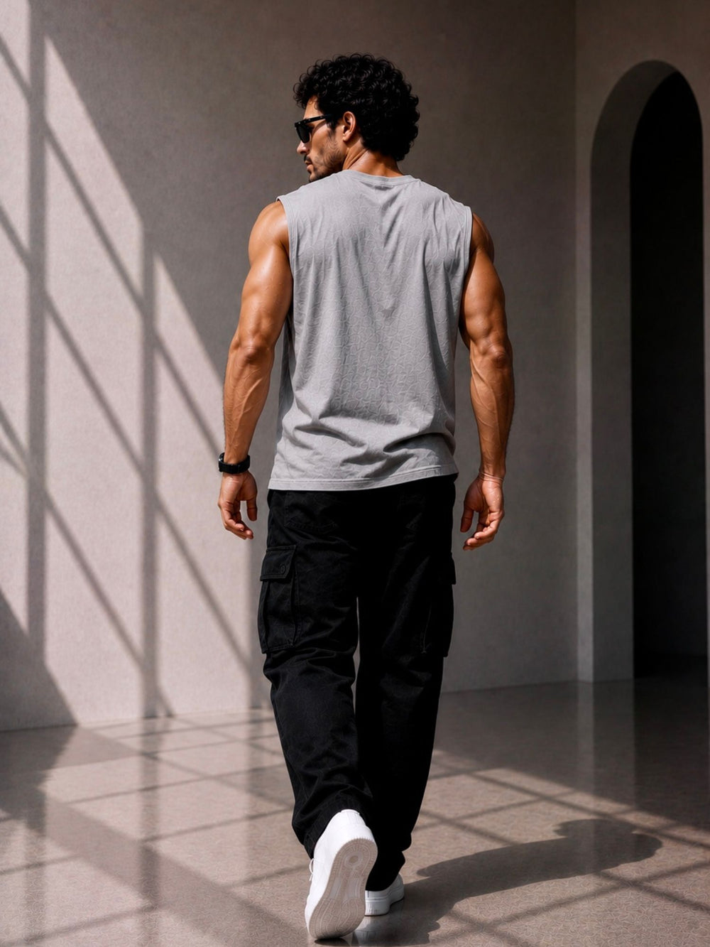 Men's gray oversized boxy tank with Falcon Face print, view 2 | FLCN